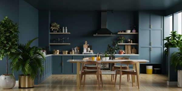 Modern kitchen interior with furniture on dark blue wall